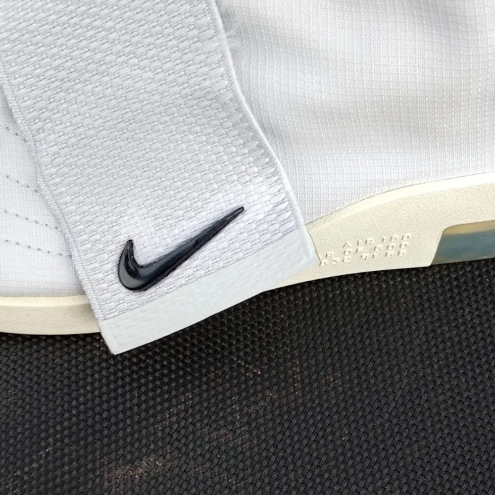Nike White Athletic Slip-Ons with Strap‎